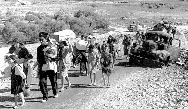 Palestinian refugees in 1948. By: Fred Csasznik