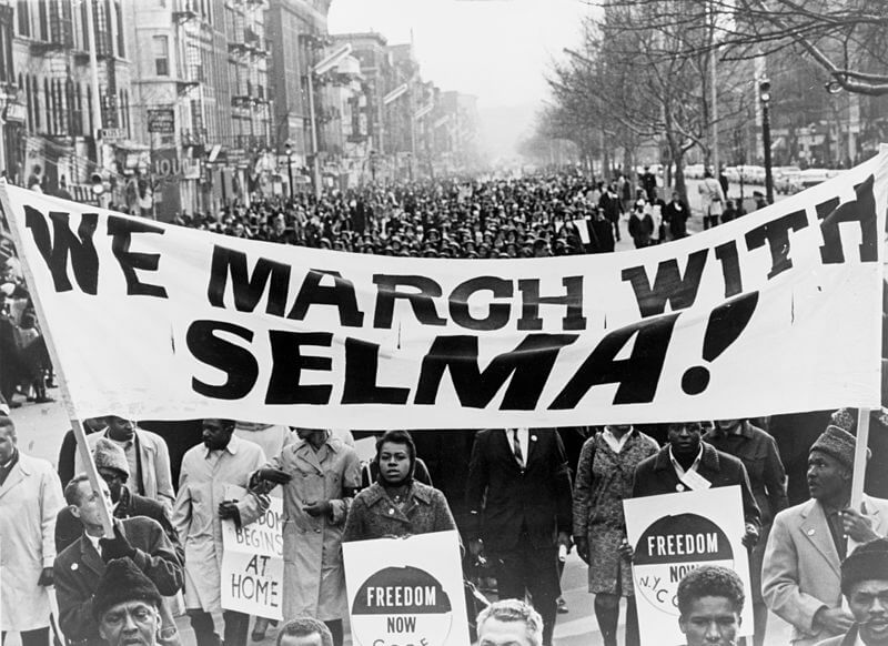 Marching for a cause in Harlem, New York City. Image: Stanley Wolfson.